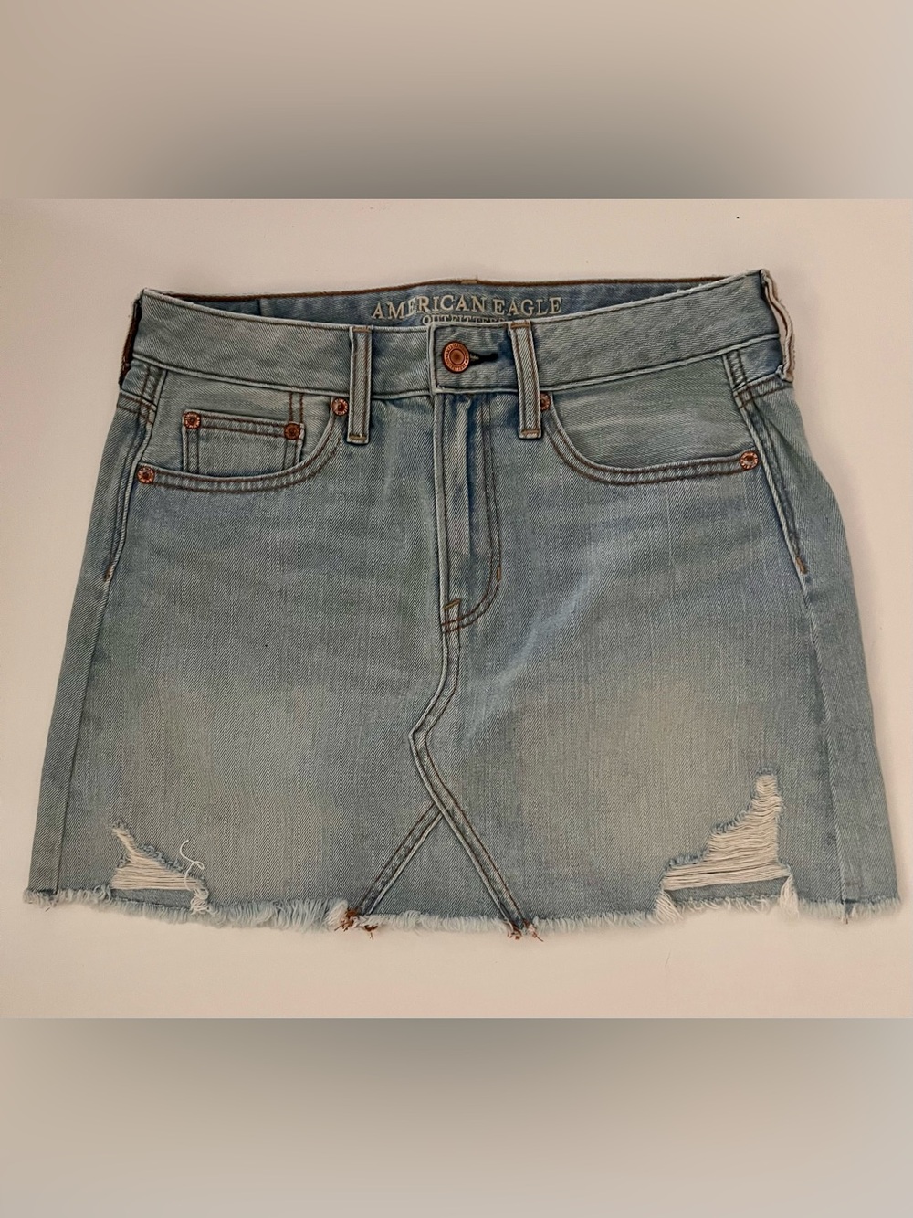 American Eagle Outfitters Light Blue Distressed Denim Mini Skirt